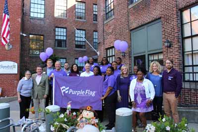 Senior Living community raises the Purple Flag